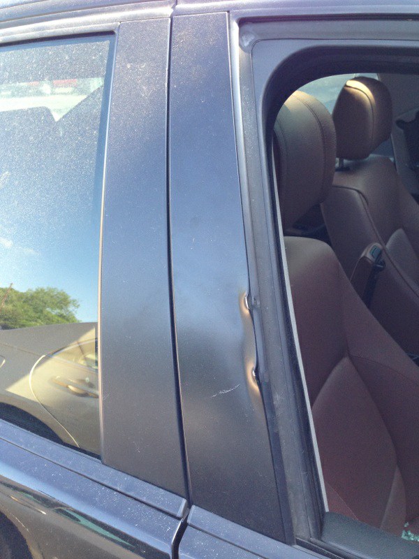 Bmw side window replacement cost